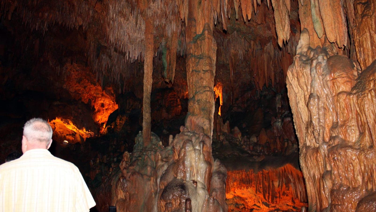 Lit stalactite formations inside a cave near Alanya