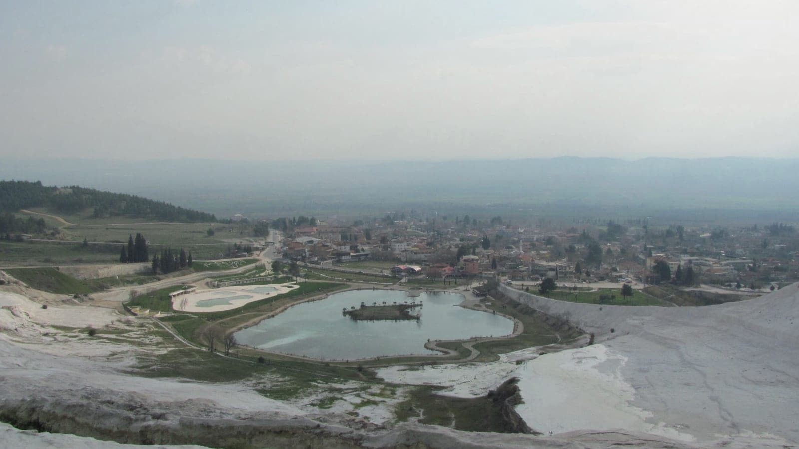 Thermal water and the lake below the white terraces of Pamukkale